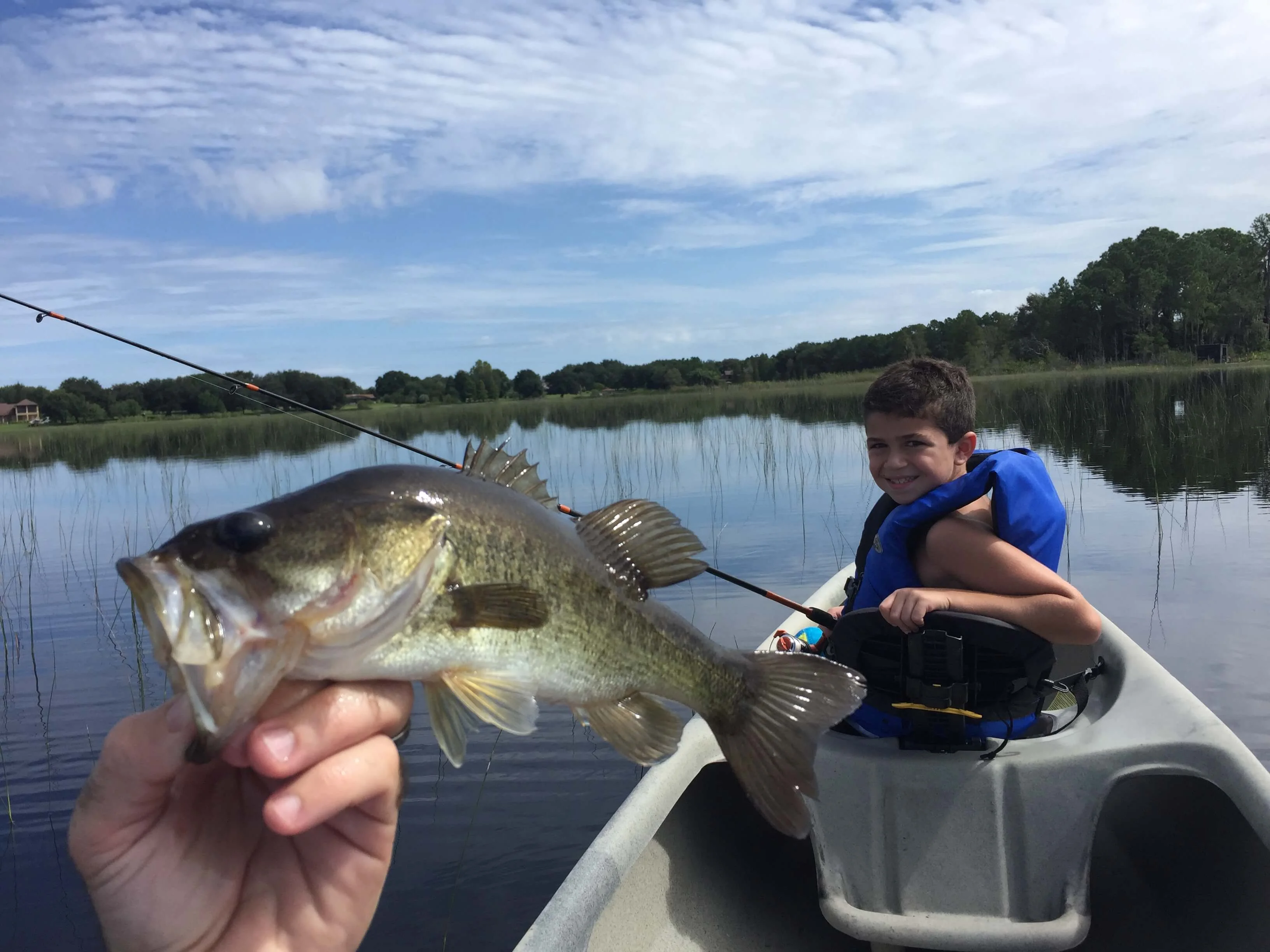 fishing on this Florida lake at The Great Escape vacation rental